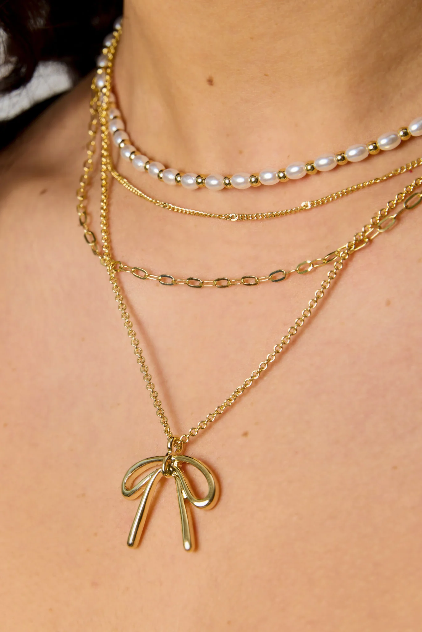Four-Strand Bow and Pearl Necklace - Image 2